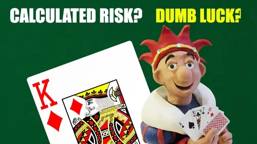 character holding playing cards